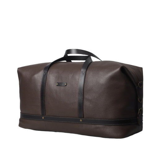 Side-angled view of spacious brown leather weekender duffel bag