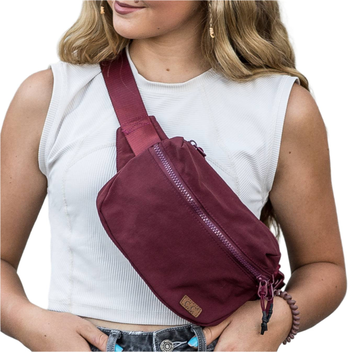 Burgandy CC Brand crossbody bag worn with casual outfit