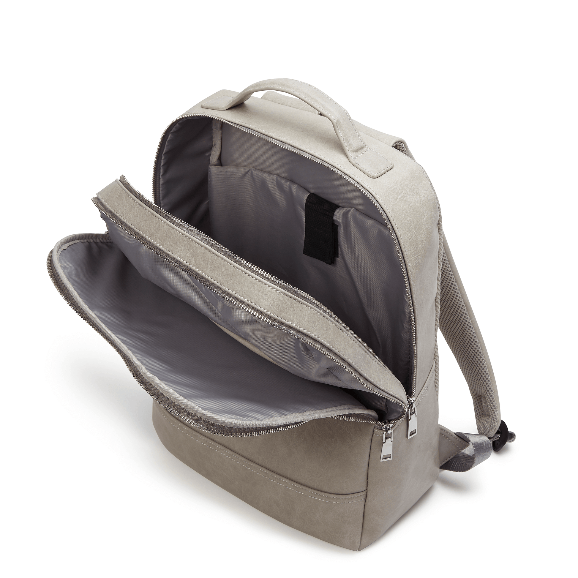 Side-angled view showing open compartments and laptop pocket of LaBante London's grey vegan leather backpack